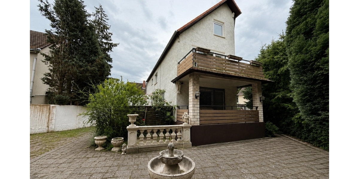 Vielseitiges Wohn- und Geschäftshaus mit großem Grundstück und Entwicklungspotenzial in Frankfurt-Bonnames - Einfamilienhaus Frankfurt am Main Bonames | Angebot:26912907
